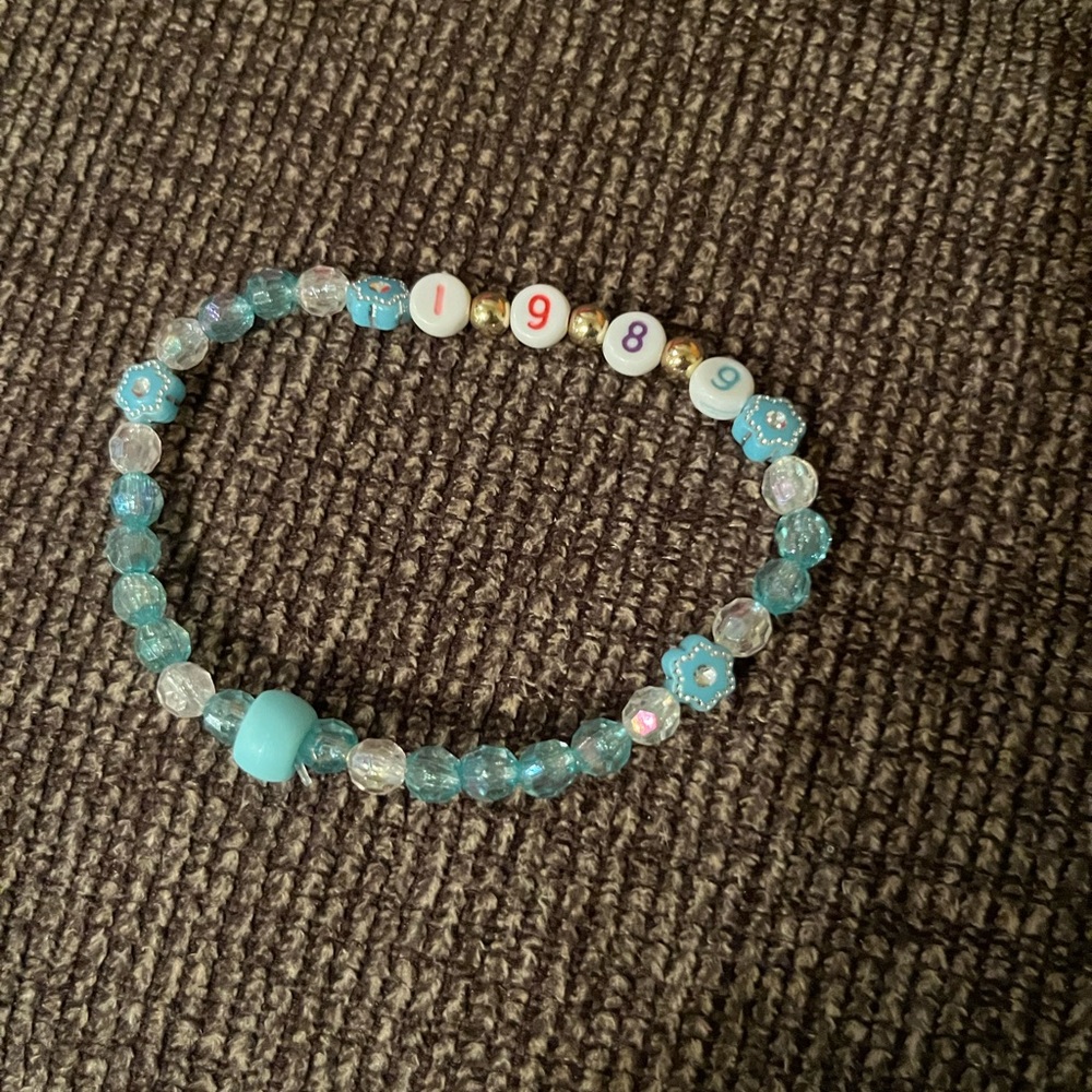 Taylor Swift "1989" bracelet.